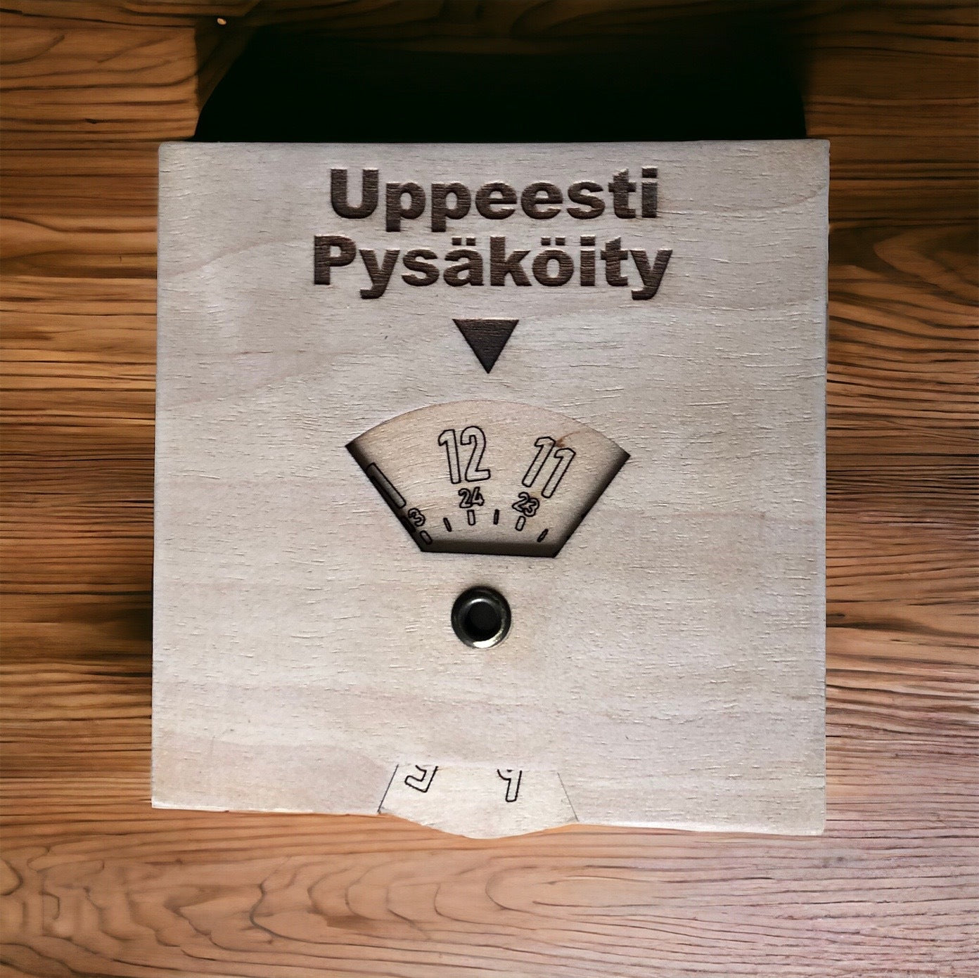 Parkkikiekko omalla tekstillä osoitin keskellä