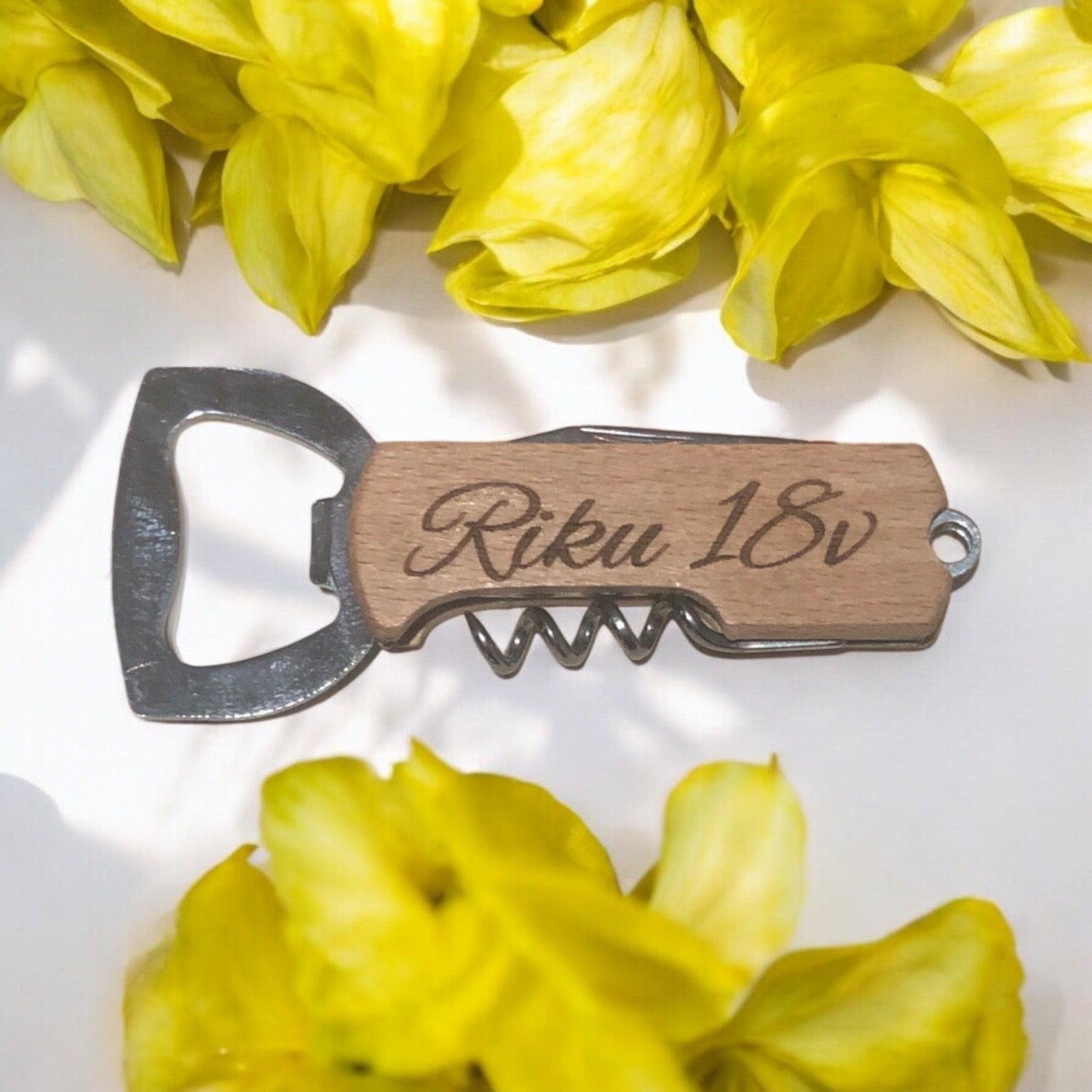 pullonavaaja_omalla_logolla_logo_puuva koivu